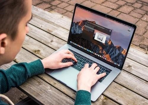 Man Working On Laptop
