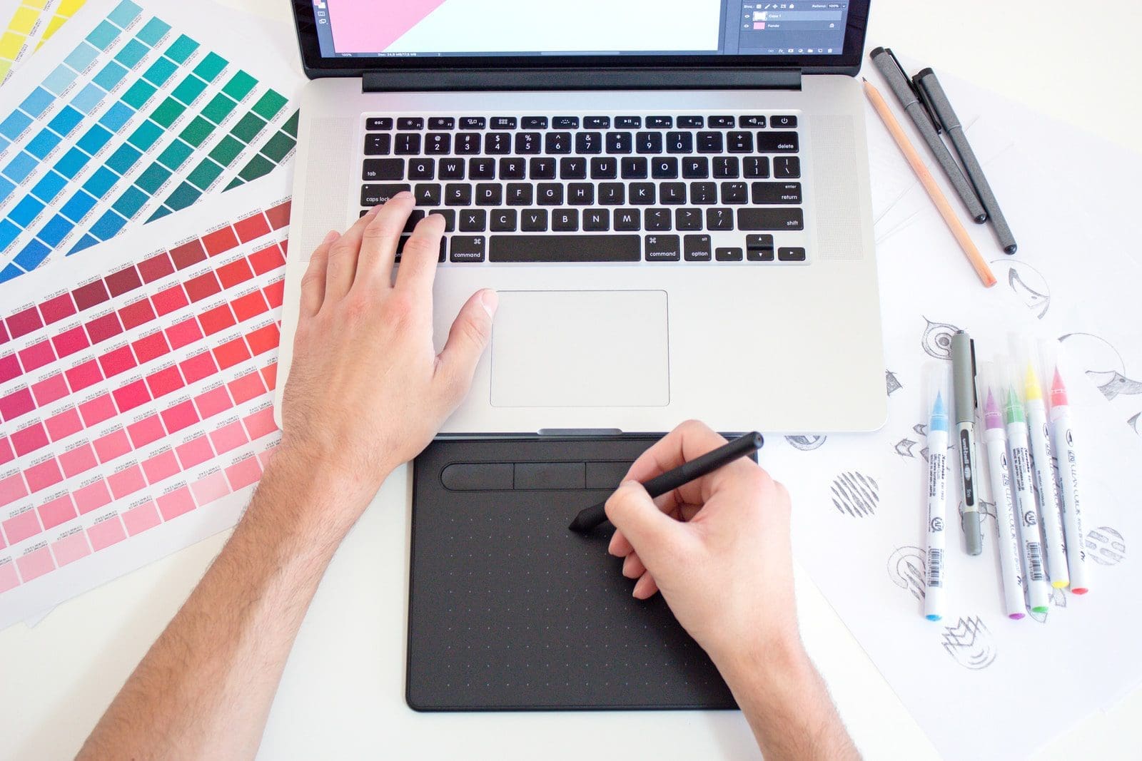 tuned on Macbook work from home jobs graphic designer