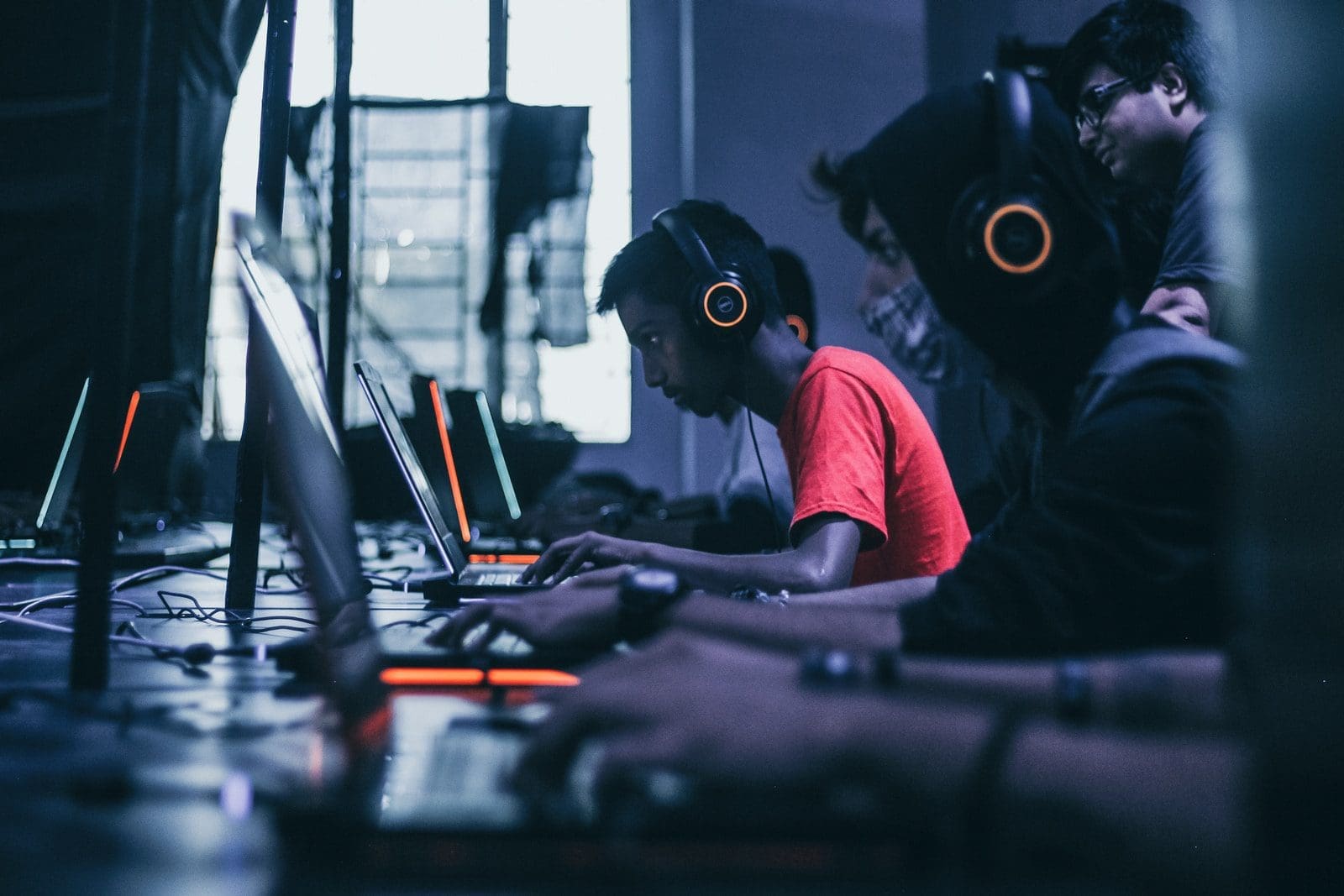 job market man playing on laptop