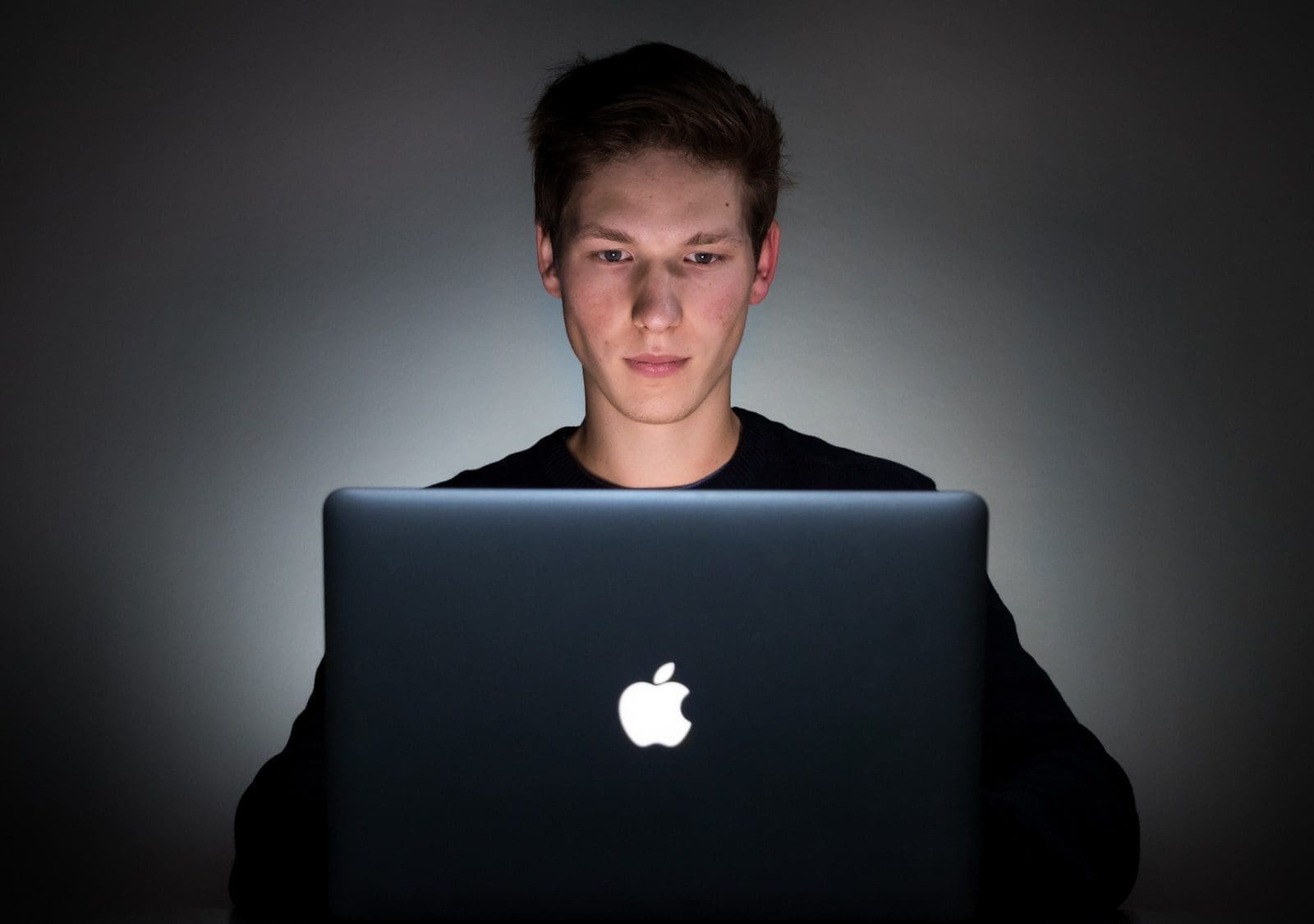man using laptop internet addiction