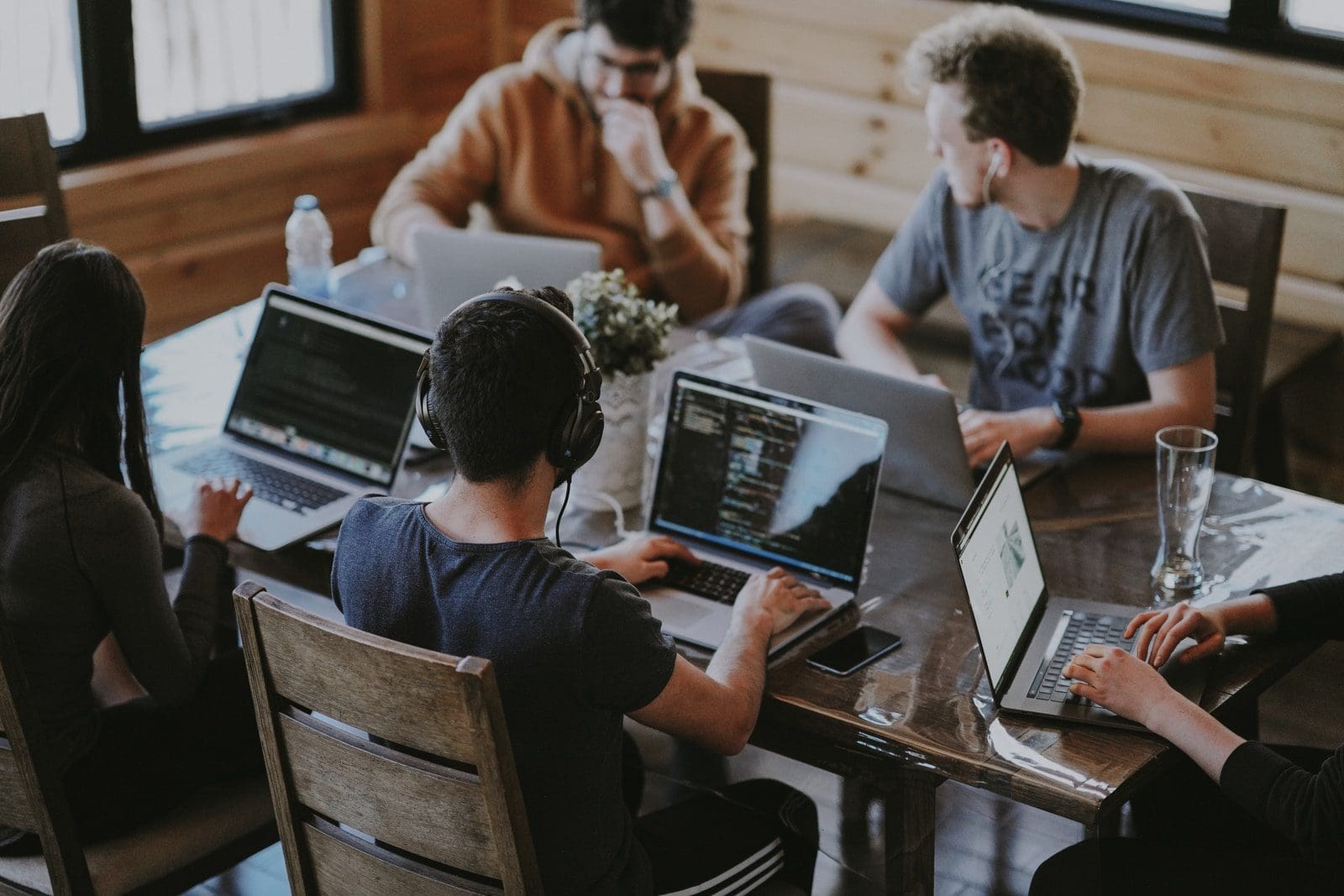 managed it services group of people using laptop computer