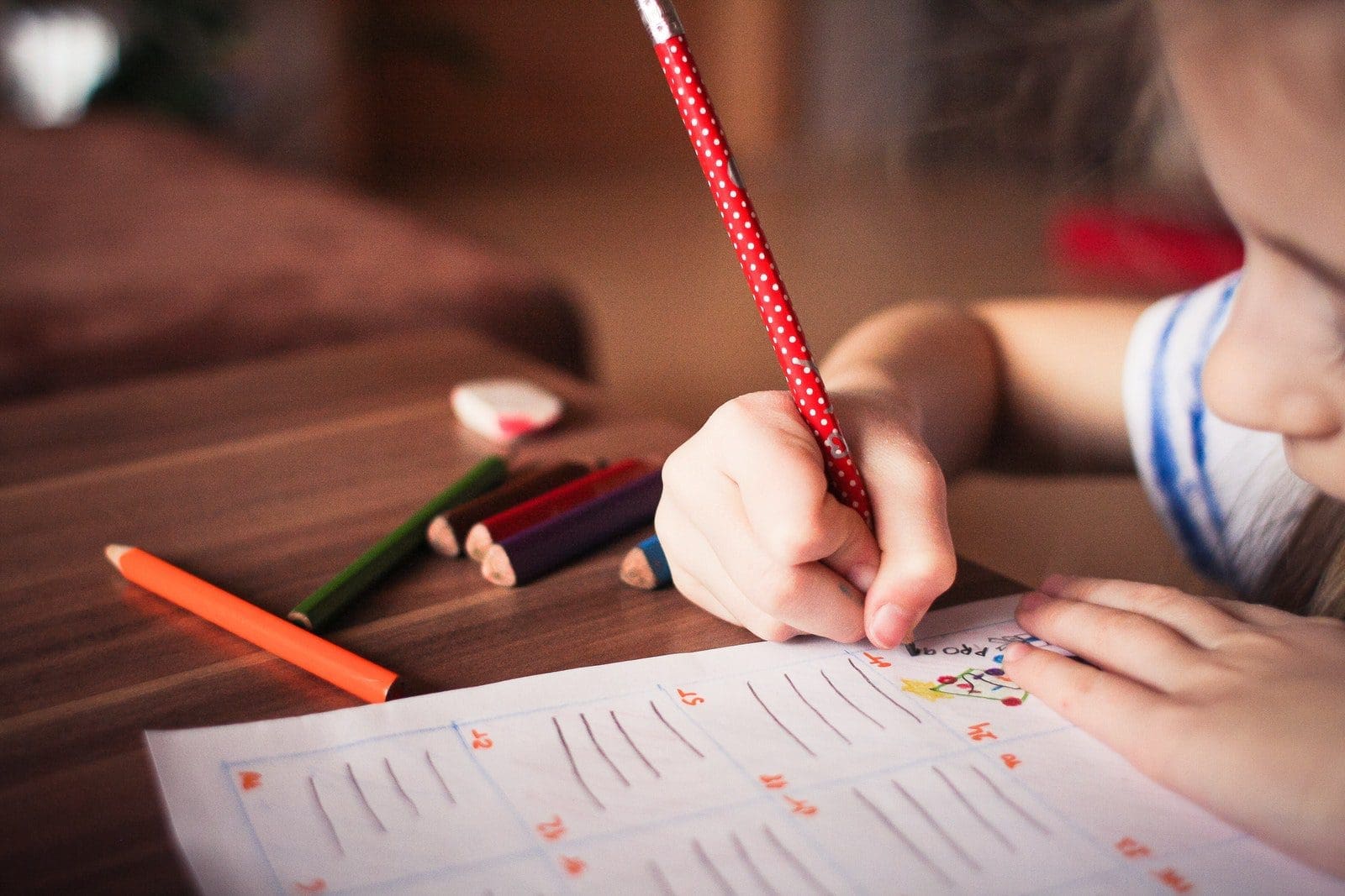 Close-up of Girl Writing