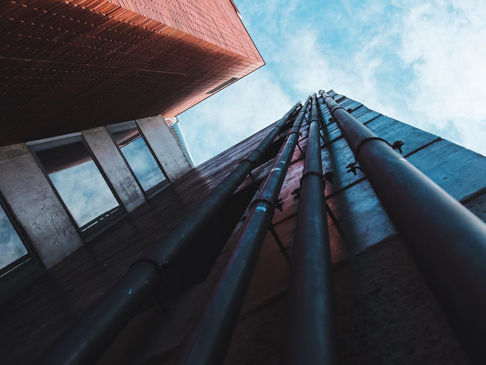 pvc pipes A Low Angle Shot of a Building with Pipes